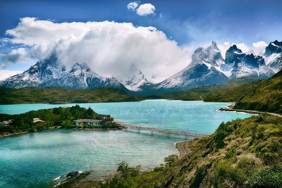 Turquoise glacial lake below the snow-covered peaks of Torres del Paine, Patagonia